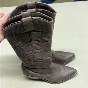 Dark brown, zippered cowboy boot.